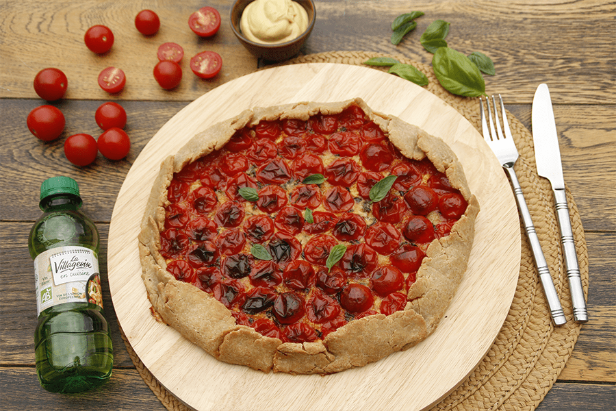 Découvrez notre recette de tarte rustique aux tomates cerises, une recette signée La Villageoise en cuisine